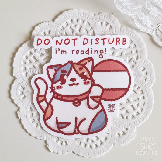 Don't Disturb Me I'm Reading cat gloss vinyl cute sticker by Chupadoodles, kawaii die-cut