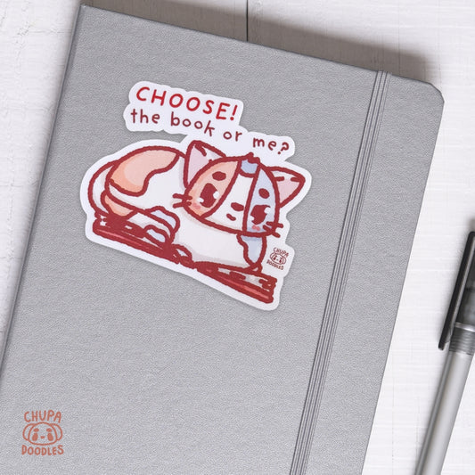 Cat Laying On A Book Cute Sticker (Matte Finish)-chupadoodles