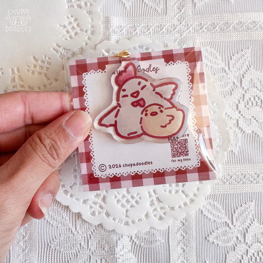 Chicken and chick epoxy keychain close up, glossy double-sided charm