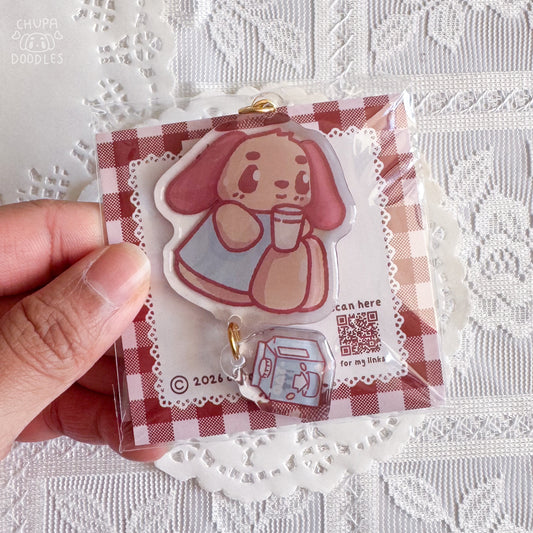 Barky double charm keychain close up, double-sided epoxy oat milk charm