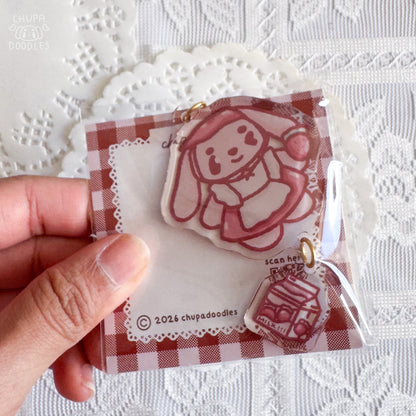 Bun Bun and strawberry milk double charm epoxy keychain by Chupadoodles, kawaii bag charm hero shot