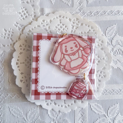 Bun Bun double charm keychain close up, double-sided epoxy strawberry milk charm