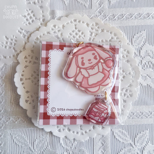 Bun Bun double charm keychain close up, double-sided epoxy strawberry milk charm