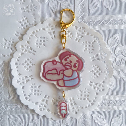 Chupa epoxy keychain styled on a pencil case, two charms on a gold-tone clasp
