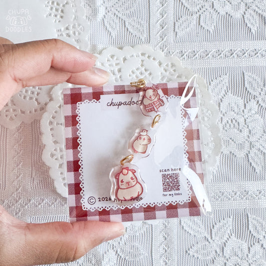 Capybara epoxy keychain close up, double-sided three-charm bag charm