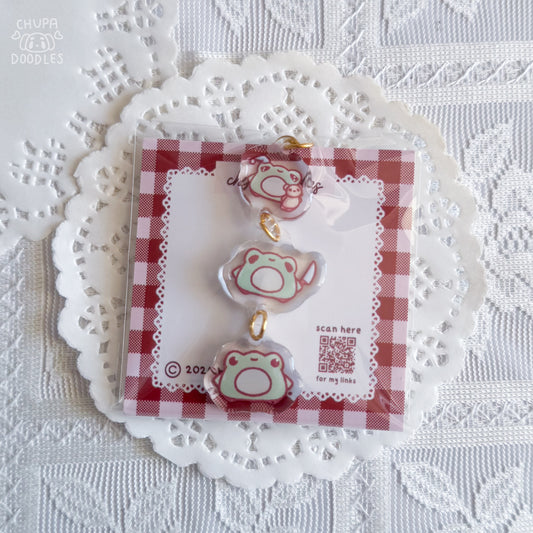 Froggies epoxy keychain close up, double-sided three-charm bag charm