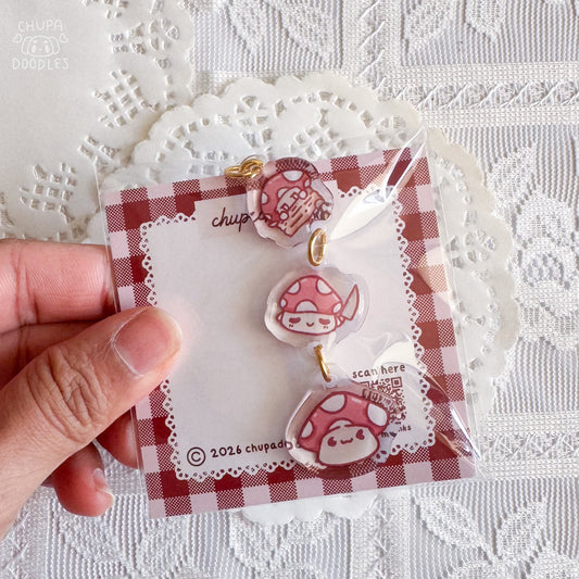Mushroom epoxy keychain close up, double-sided three-charm bag charm