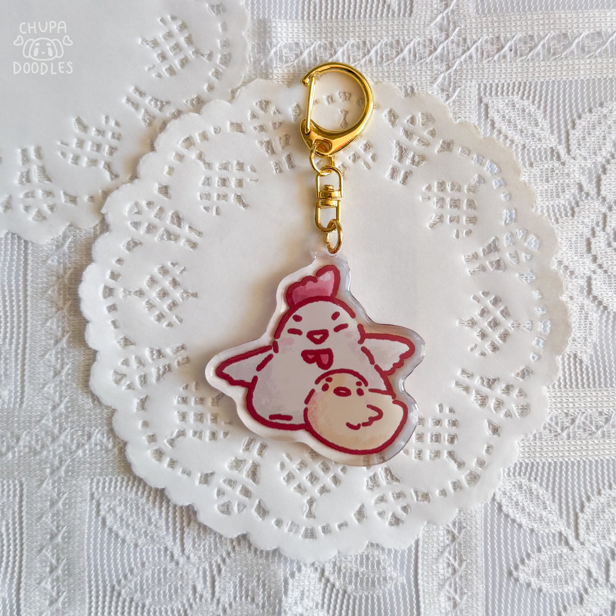 Chicken and chick epoxy keychain by Chupadoodles, double-sided kawaii bag charm