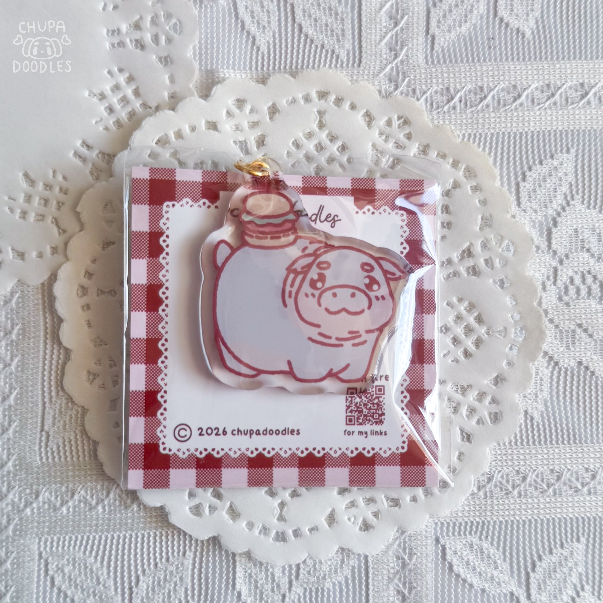 Moo Deng epoxy keychain by Chupadoodles, double-sided kawaii bag charm